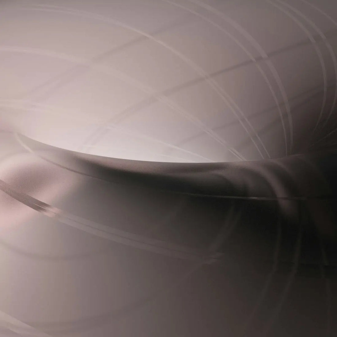 a blurry image of a curved object